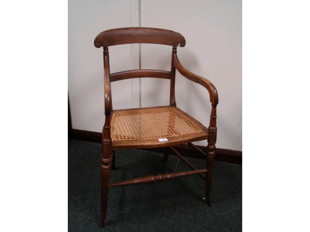 Appraisal: A thC simulated rosewood carver chair with cane seat