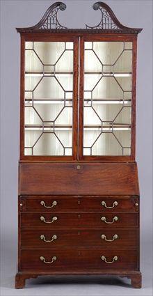 Appraisal: GEORGE III MAHOGANY BUREAU BOOKCASE The pierced swan's neck crest