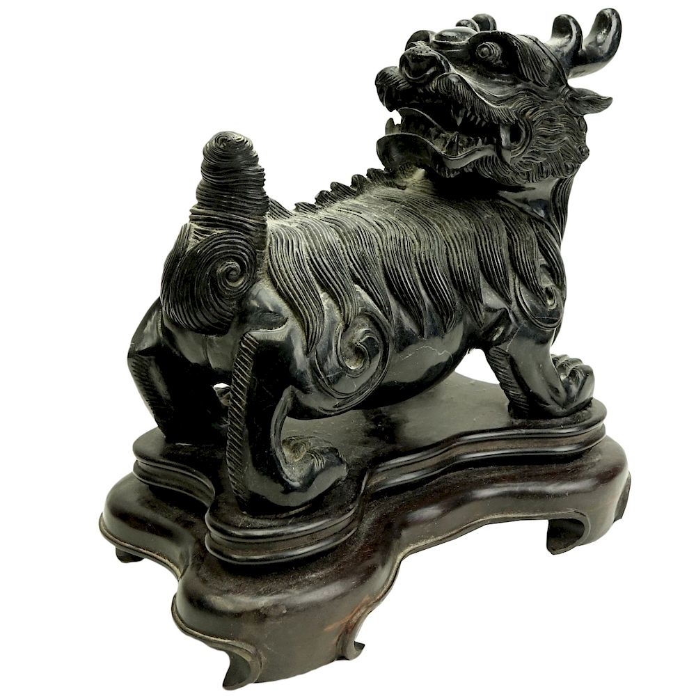 Appraisal: Large Chinese Carved Black Stone Foo Dog Dragon Large Chinese