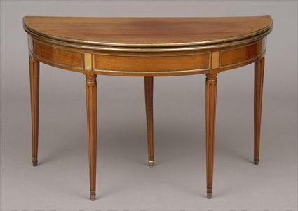 Appraisal: LOUIS XVI BRASS-MOUNTED MAHOGANY DEMILUNE GAMES TABLE The folding top