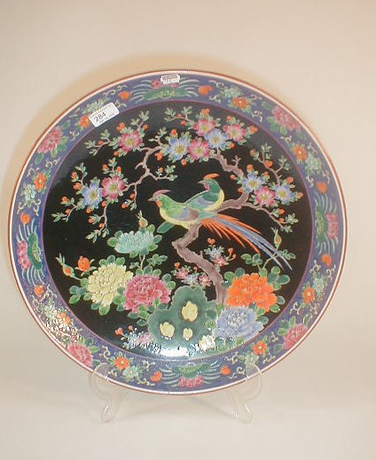 Appraisal: A Japanese porcelain charger decorated in enamels of the Chinese