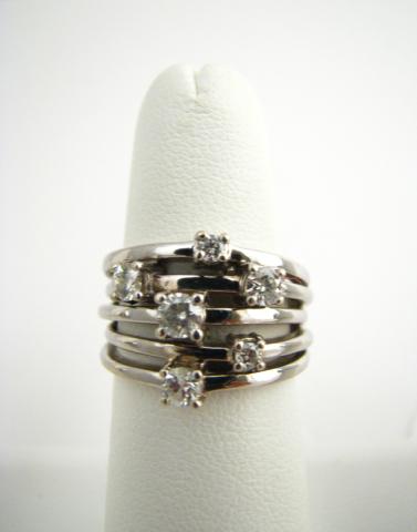 Appraisal: K White Gold Ring with Six Diamonds in multi-band illusionary