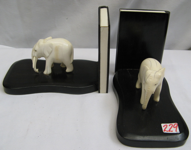 Appraisal: PAIR OF CHINESE CARVED IVORY ELEPHANT BOOKENDS the pair fitted