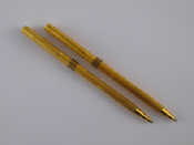 Appraisal: Two gilt metal Aurora ballpoint pens