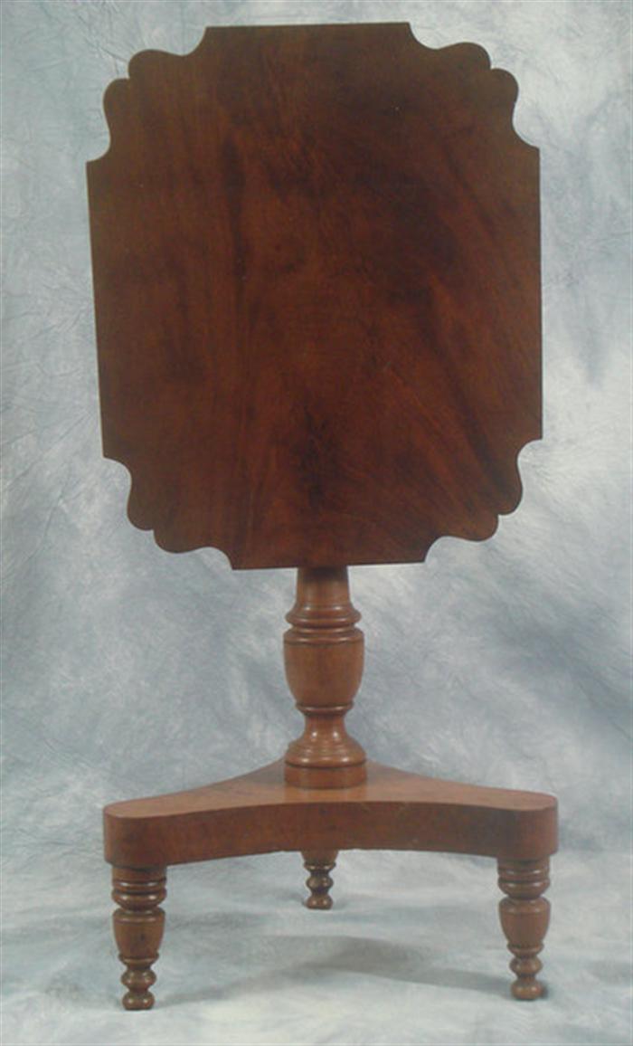 Appraisal: Mahogany tilt top Federal candle stand on a platform base