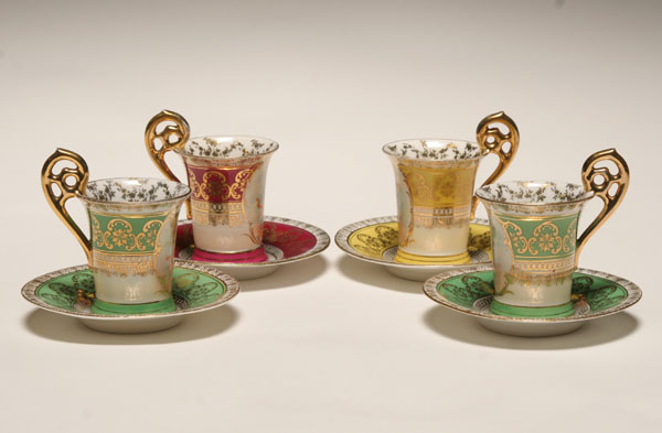 Appraisal: Royal Vienna porcelain demitasse cups and saucers hand touched transferware