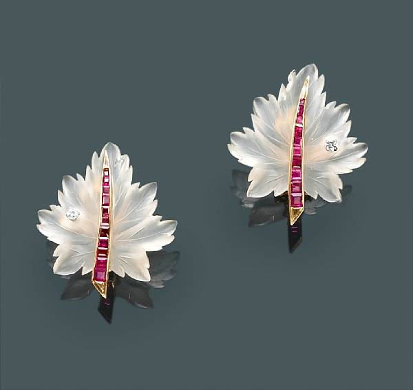 Appraisal: A pair of rock crystal ruby and diamond leaf motif