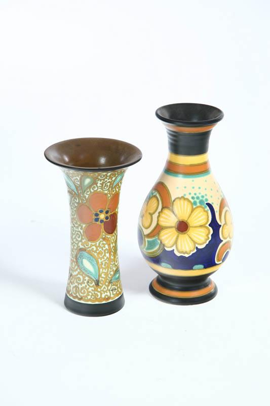 Appraisal: TWO GOUDA POTTERY VASES Both with polychrome floral decoration Elongated