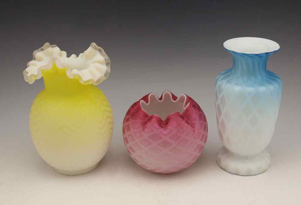 Appraisal: SATIN QUILTED ART GLASS VASES Pink yellow and blue ''