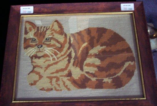 Appraisal: An embroidered panel depicting a cat th Century cm x