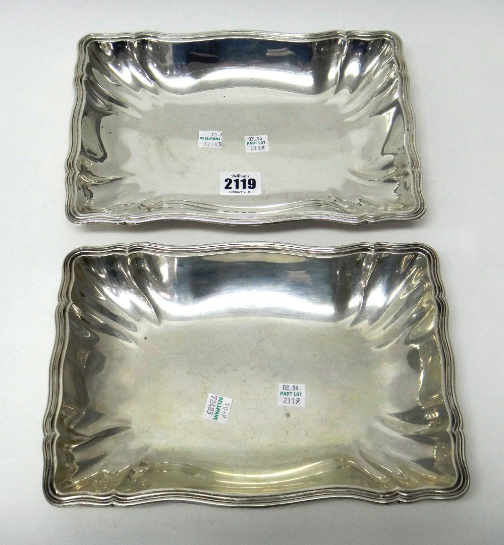 Appraisal: A pair of German shaped rectangular serving dishes having reeded