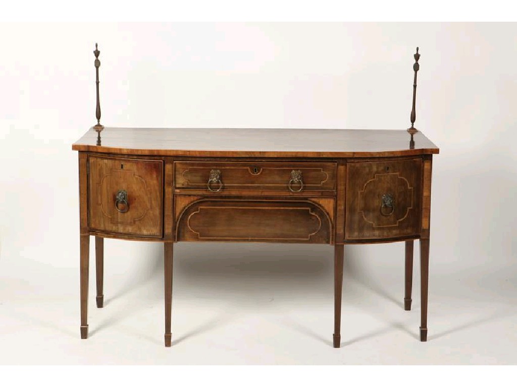 Appraisal: A GEORGE III MAHOGANY SIDEBOARD the bow fronted top with