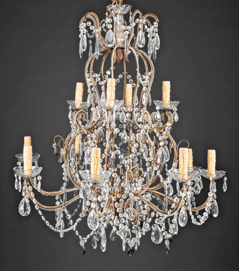 Appraisal: Pair of Continental Gilt Metal and Crystal Twelve-Light Chandeliers scrolling