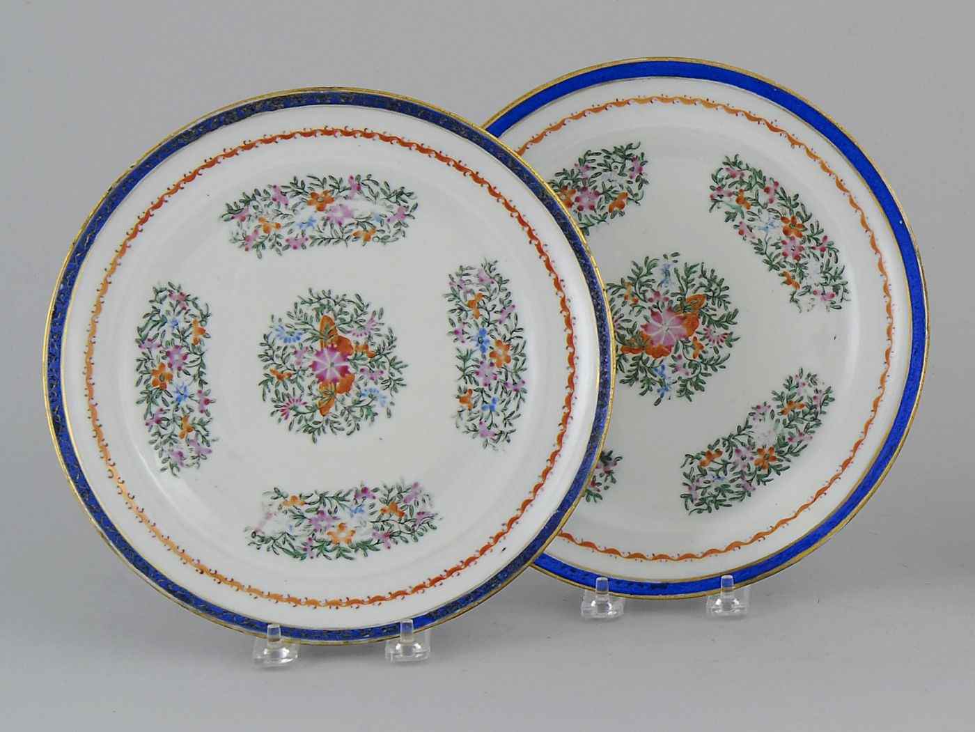 Appraisal: PAIR OF UNUSUAL CHINESE EXPORT POLYCHROME FITZHUGH PORCELAIN SERVING PLATESCirca