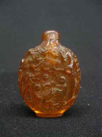 Appraisal: Chinese Carved Amber Snuff Bottle scenes with villagers '' excellent