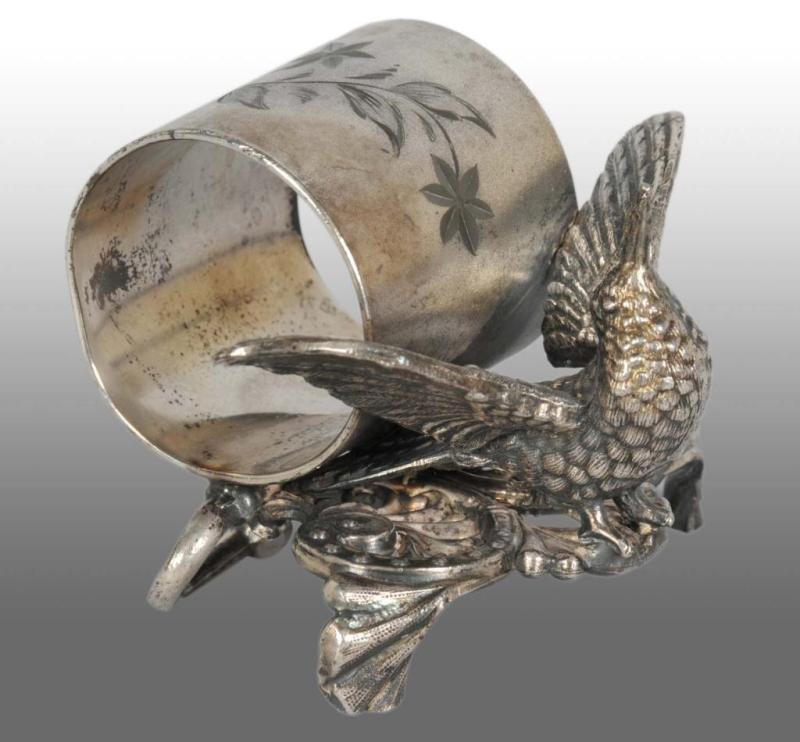 Appraisal: Hummingbird Figural Napkin Ring Description Marked Van Bergh Silverplate Co