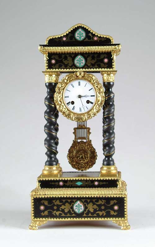 Appraisal: EMPIRE STYLE MANTLE CLOCK Four spiral open columns support a