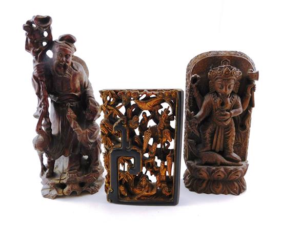 Appraisal: ASIAN Three th C wooden carvings first a bas relief