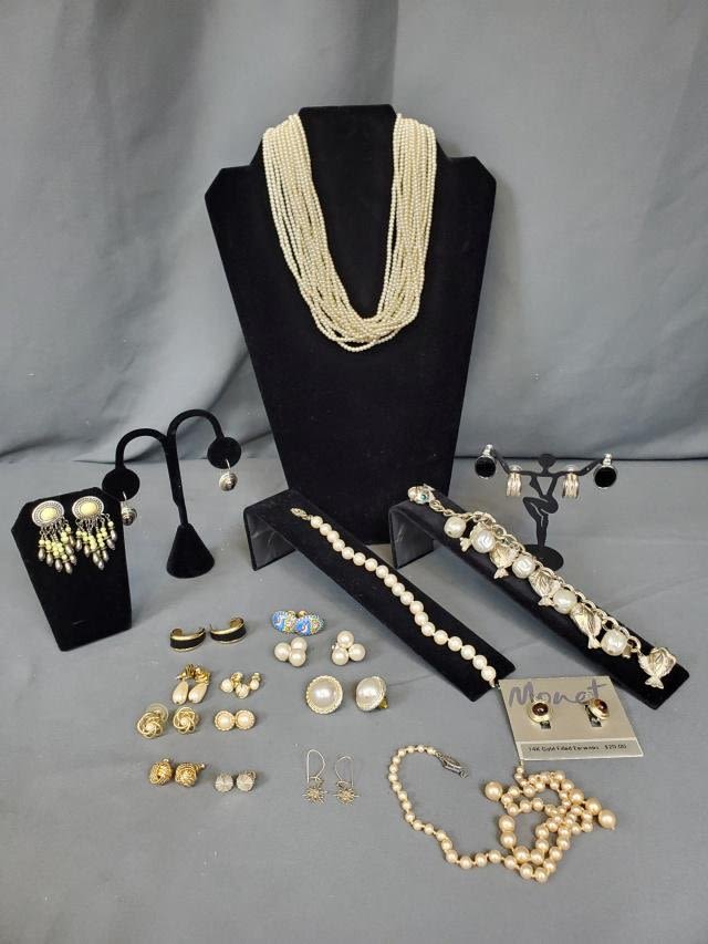 Appraisal: Group includes a inch multi strand faux pearl necklace in