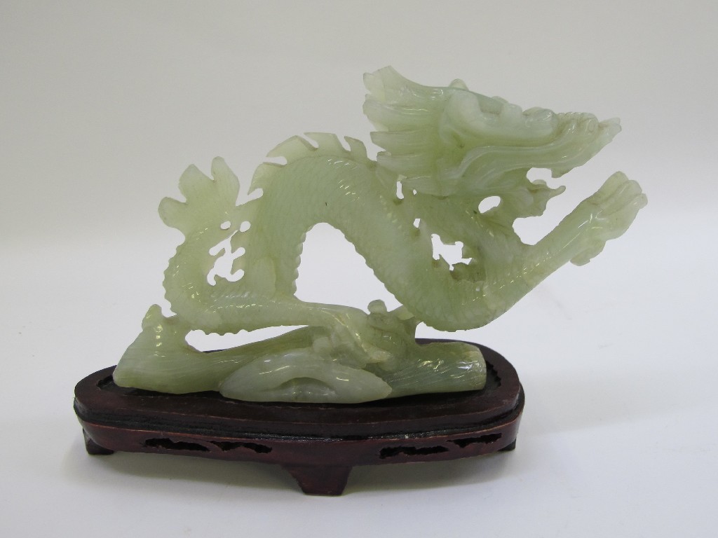 Appraisal: Jade dragon on wooden base