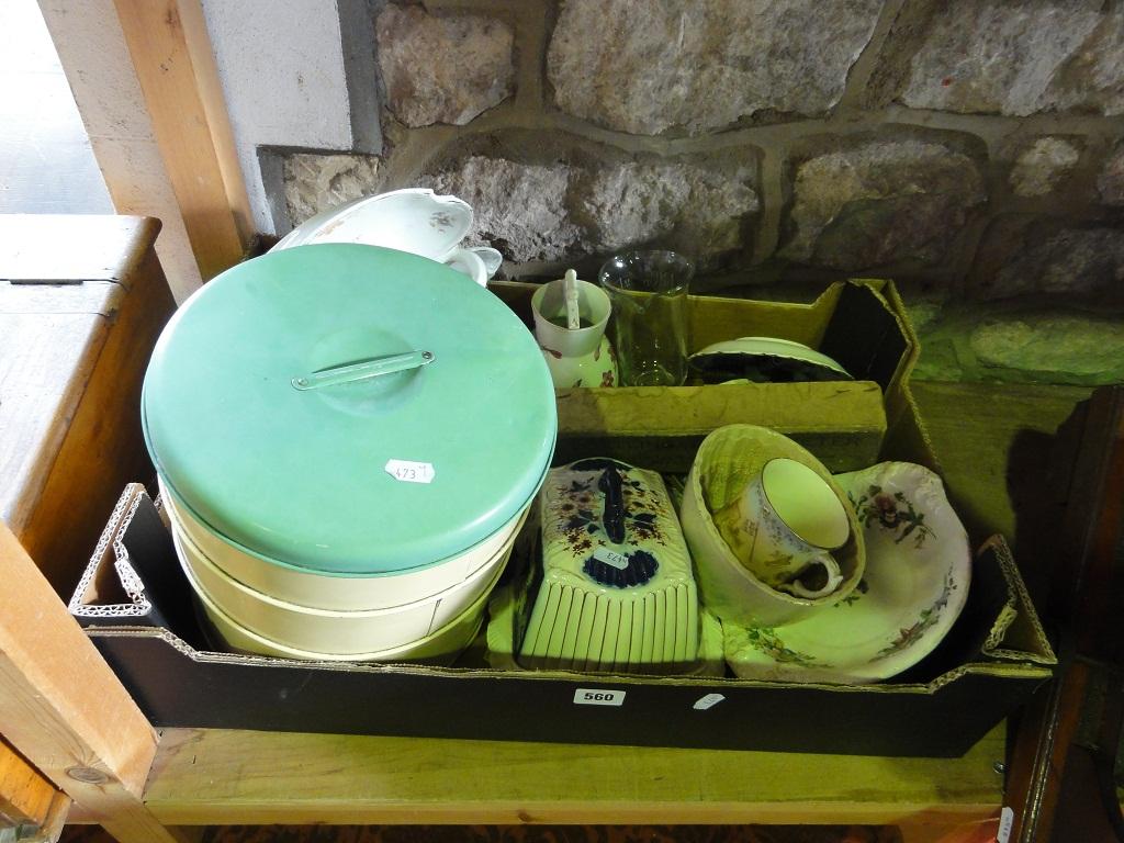 Appraisal: A green and cream enamel biscuit tin in three sections