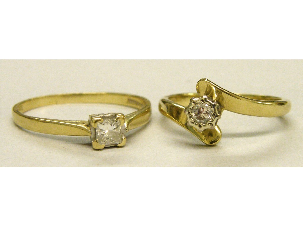 Appraisal: ct solitaire diamond ring and another ct cross-over design solitaire