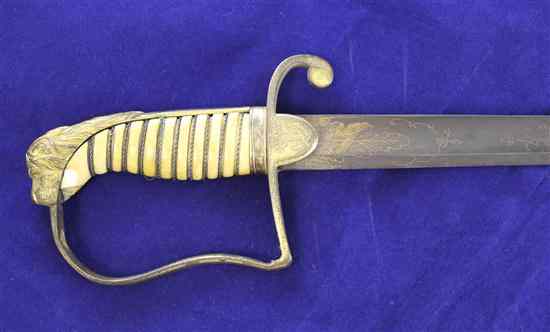 Appraisal: An early th century Naval officer's sword with inch blade