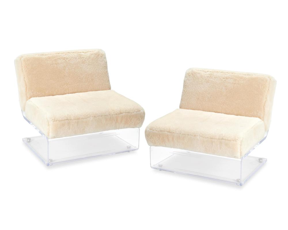 Appraisal: A pair of Lucite and shearling chairs by Martyn Lawrence