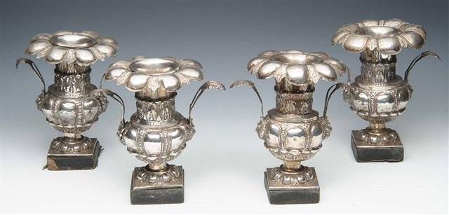 Appraisal: A SET OF FOUR ITALIAN WHITE METAL VASES with flared