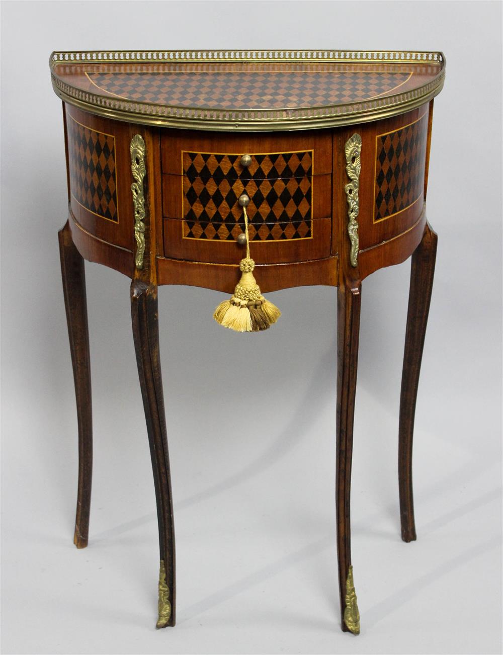 Appraisal: LOUIS XVI STYLE INLAID DEMILUNE TABLE having a pierced metal