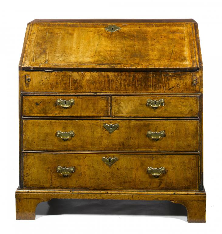 Appraisal: A GEORGE I WALNUT AND FEATHERBANDED BUREAU the stepped and