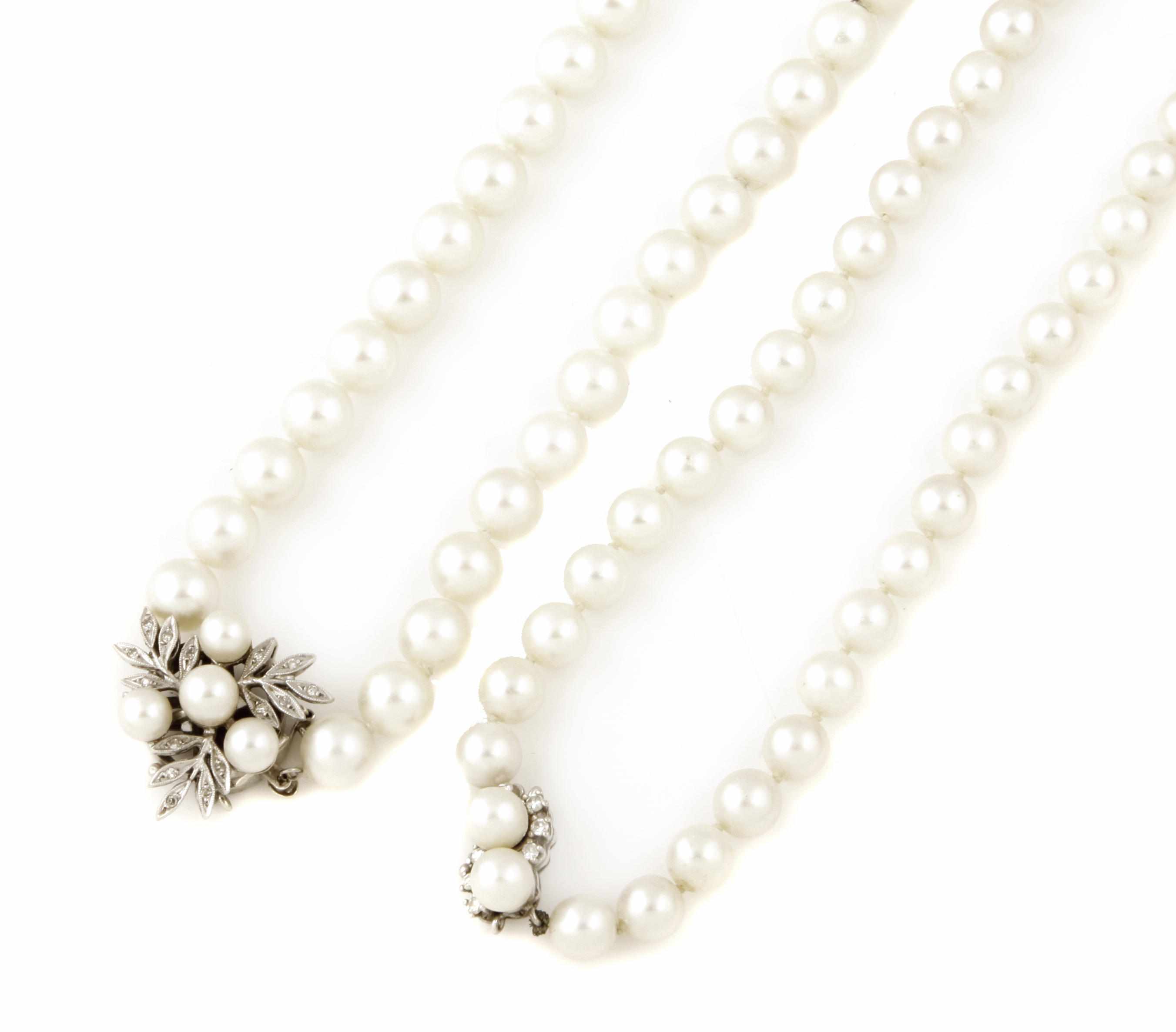 Appraisal: A collection of two cultured pearl necklaces with diamond and