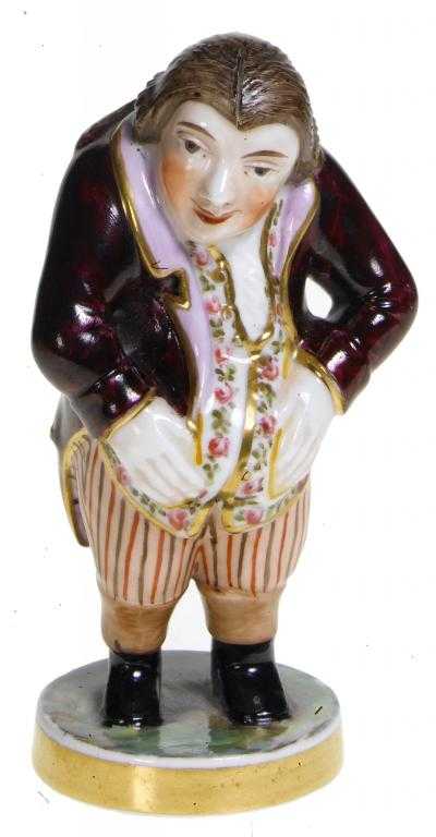 Appraisal: A SAMPSON HANCOCK FIGURE OF THE LAUGHING PHILOSOPHER in claret