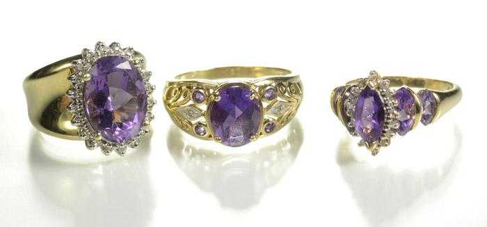 Appraisal: THREE AMETHYST AND DIAMOND RINGS including one set with an