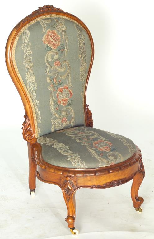 Appraisal: VICTORIAN SPOON-BACK NURSING CHAIR with floral-carved crest above a drop-in