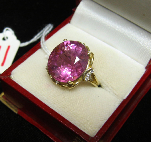 Appraisal: PINK TOURMALINE DIAMOND AND FOURTEEN KARAT GOLD RING centering a