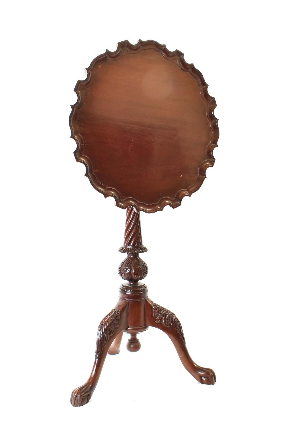 Appraisal: GEORGE III STYLE MAHOGANY TILT-TOP TRIPOD TABLEThe circular top with