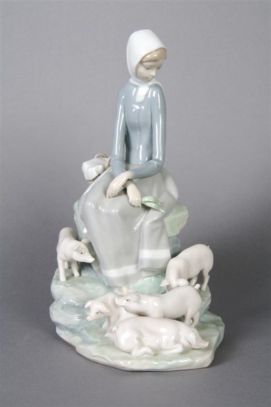 Appraisal: A Lladro Figural Group Height inches