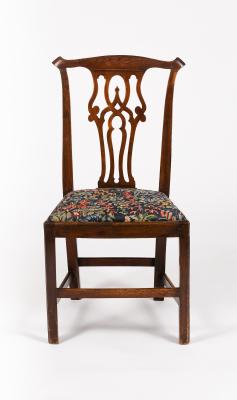 Appraisal: A George III fruitwood chair with pierced upright splat back