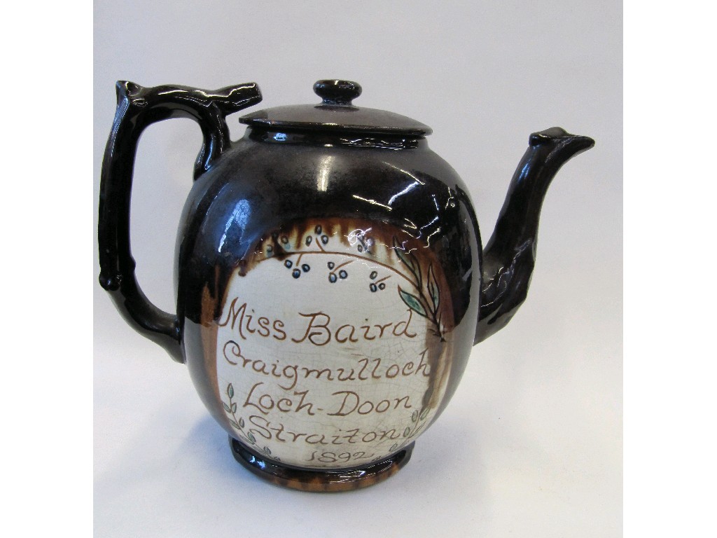 Appraisal: Cumnock Pottery teapot in brown glaze with a cream cartouche