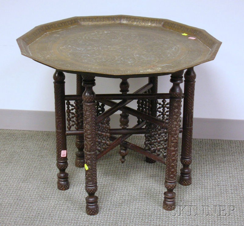 Appraisal: Persian Decorated Brass Tray on Folding Carved Hardwood Stand tray