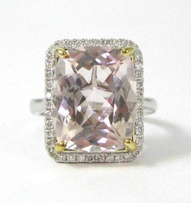 Appraisal: KUNZITE DIAMOND AND FOURTEEN KARAT GOLD RING The white and