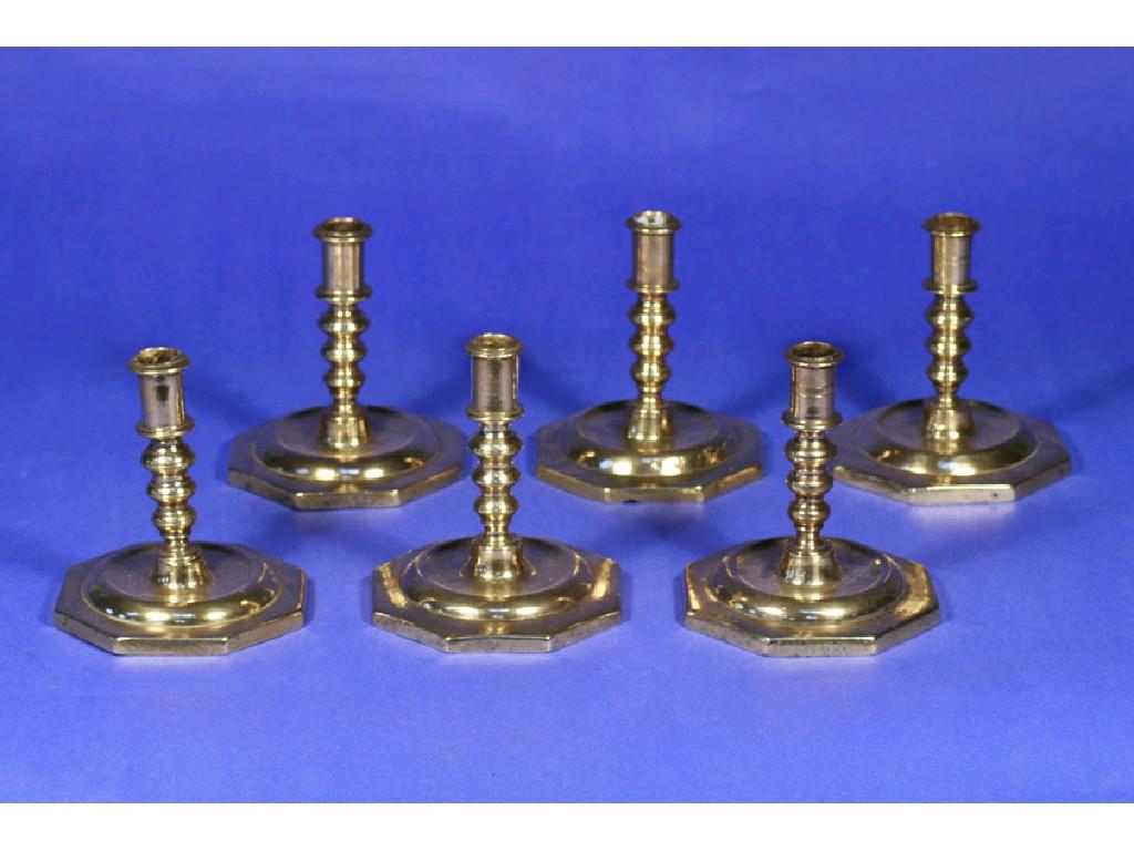 Appraisal: A NEAR SET OF SIX GEORGE I STYLE BRASS CANDLESTICKS