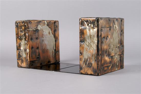 Appraisal: A Pair of Metal Clad Bookends attributed to Paul Evans