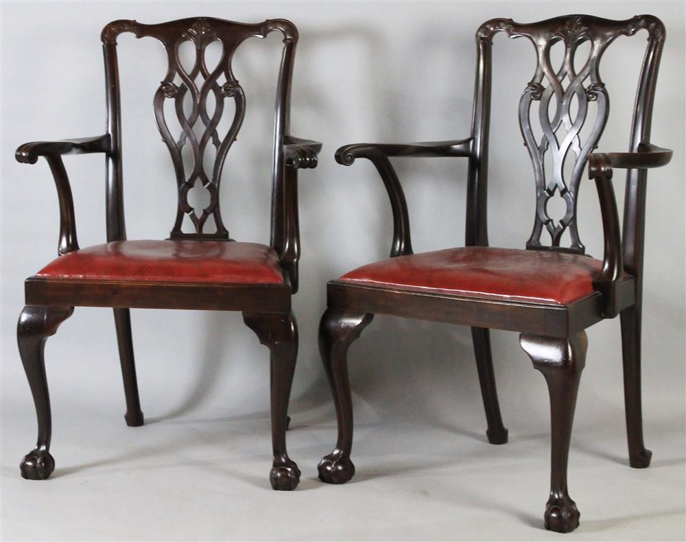 Appraisal: PAIR OF CHIPPENDALE STYLE MAHOGANY ARM CHAIRS serpentine crest with