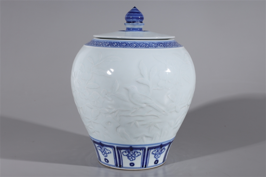 Appraisal: Chinese porcelain blue and white covered vase with floral design