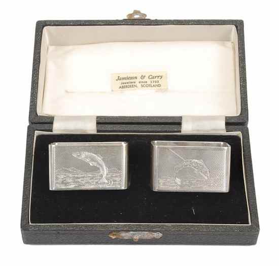 Appraisal: Two silver rectangular napkin rings by A Wilcox Birmingham and