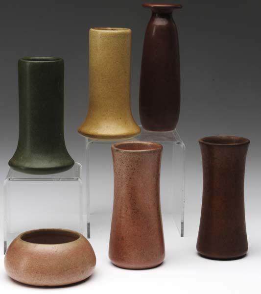 Appraisal: MARBLEHEAD Five bud vases and one small bowl covered in