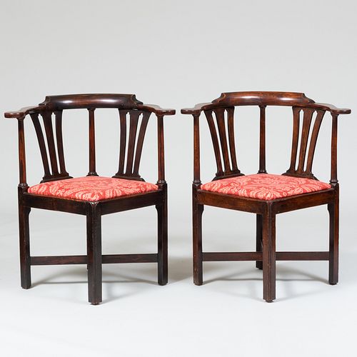 Appraisal: NEAR PAIR OF GEORGE III STYLE STAINED OAK CORNER CHAIRS