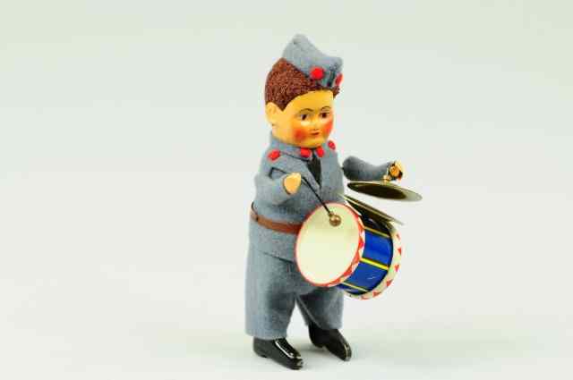 Appraisal: GERMAN BOY DRUMMER Schuco interesting wind up German boy figure